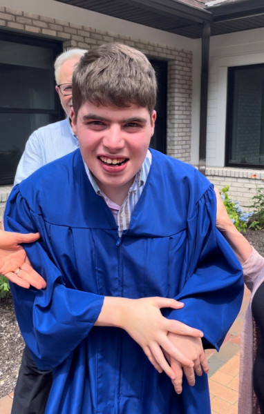 Luke-smile-in-gown